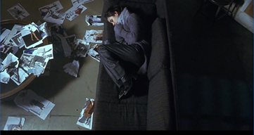 A person lying on a couch